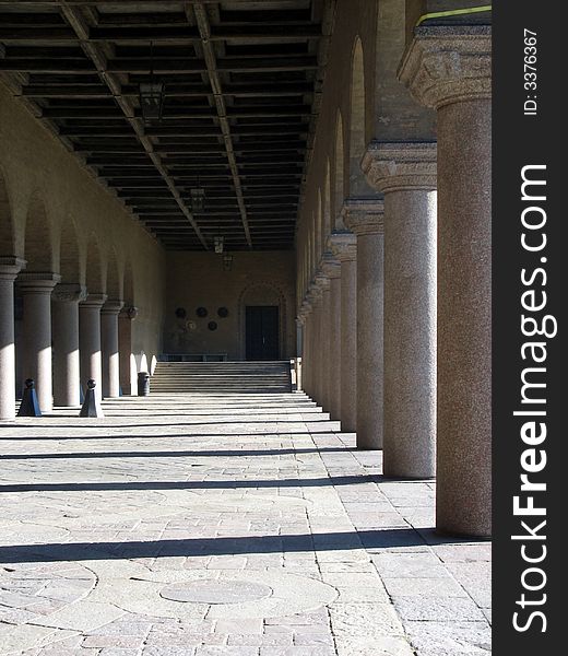 Pillars at an entrance to a giant beautiful building. Pillars at an entrance to a giant beautiful building