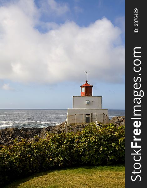 Light house over cloudy sky in Tofino canada