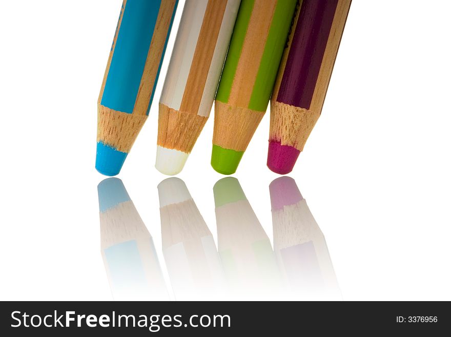 Four colorful wooden pencils isolated over white background. Four colorful wooden pencils isolated over white background