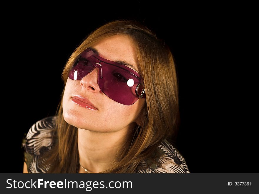 Woman close up portrait shot on black backdrop