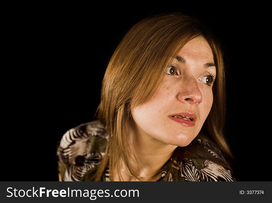 Woman close up portrait shot on black backdrop