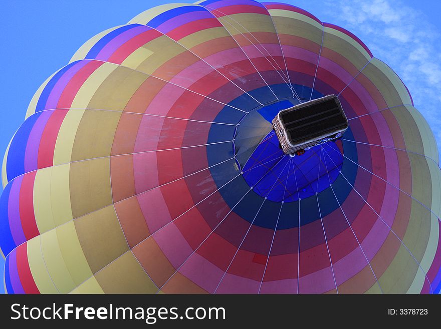 View of a hot air balloon from the bottom. View of a hot air balloon from the bottom.