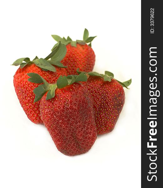 Isolated fresh red strawberries on white background. Isolated fresh red strawberries on white background