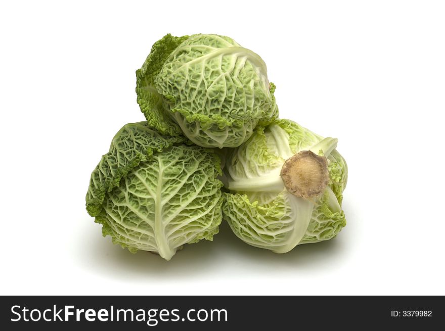 Three cabbage on white background