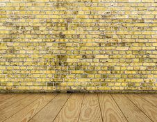 Indoor Background With Yellow Brick Wall And Wooden Plank Floor Royalty Free Stock Photography Indoor Background With Yellow Brick Wall And Wooden Plank Floor Royalty Free Stock Photography