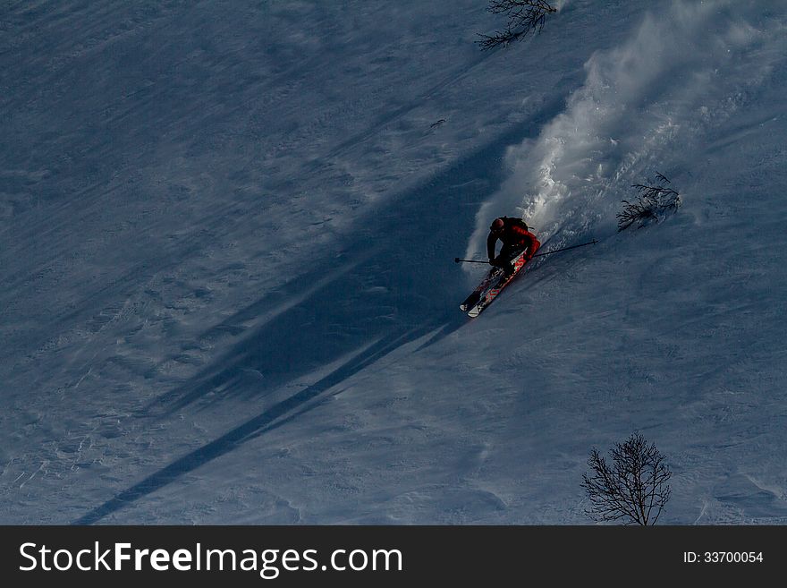 Freerider going down the mountain of  Kamchatka. Freerider going down the mountain of  Kamchatka