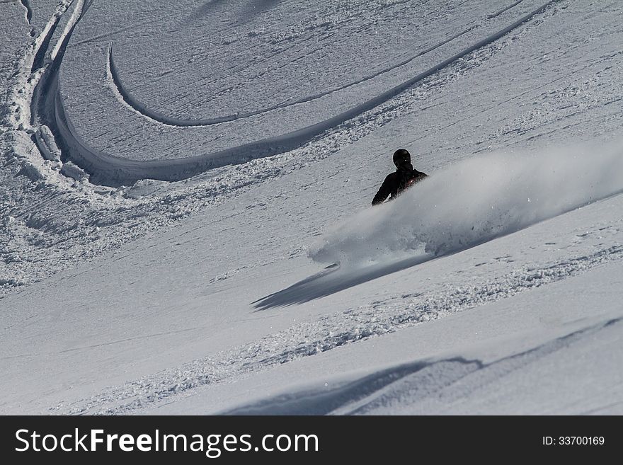 Freerider going down the mountain of Kamchatka. Freerider going down the mountain of Kamchatka