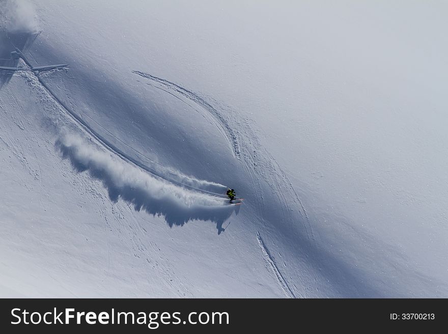 Freerider going down the mountain of Kamchatka. Freerider going down the mountain of Kamchatka