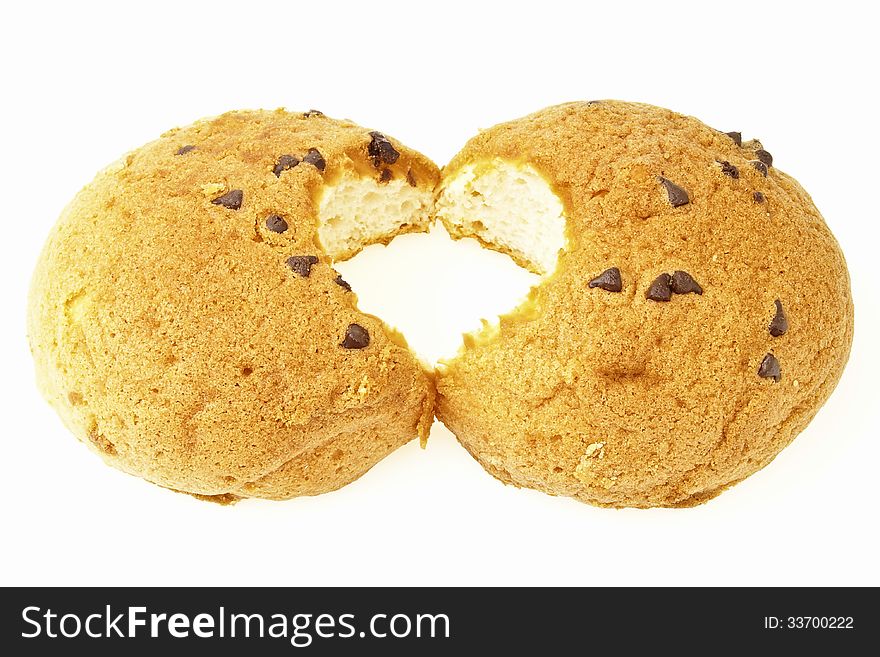 Join of eating tasty bun in heart shape on white background. Join of eating tasty bun in heart shape on white background