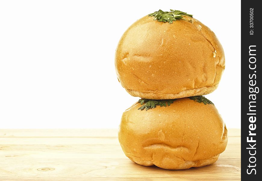 Stack of double shred chicken mayo bread on wood floor in white background. Stack of double shred chicken mayo bread on wood floor in white background