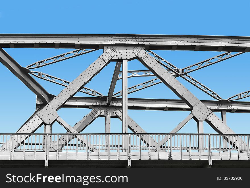 Vintage iron bridge with blue sky