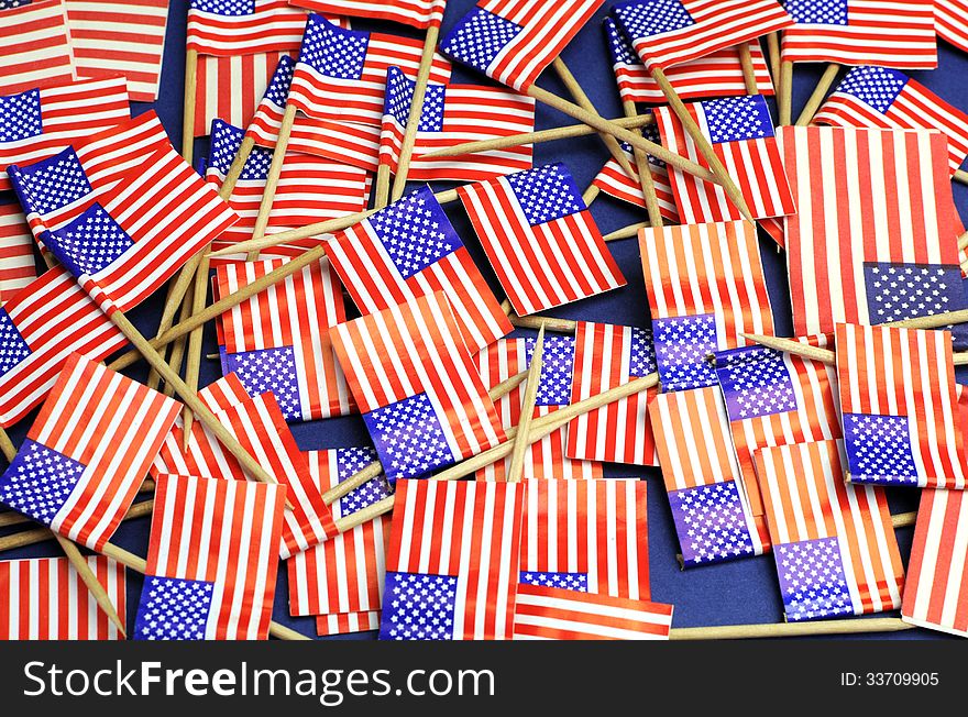 Abstract background of USA Stars and Stripes, red white and blue national toothpick flags for national emblem or public holiday event.