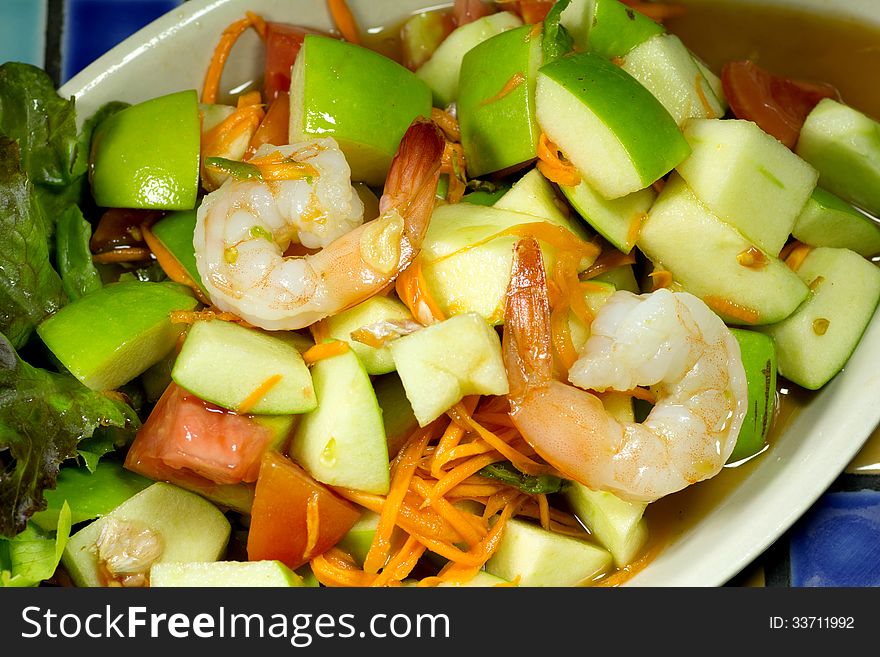 Apple shrimp salad in thai style