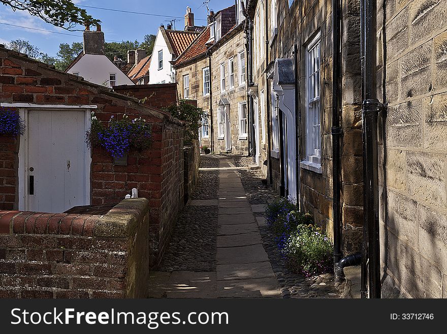 Cobbled alley and street scene Robin Hoods Bay