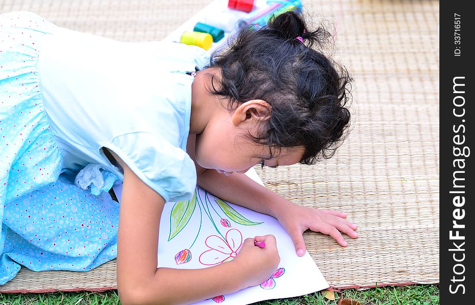Going Back To School,Girl Drawing And Painting Over Green Grass