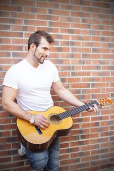 Artist Playing Guitar. Royalty Free Stock Photography Artist Playing Guitar. Royalty Free Stock Photography