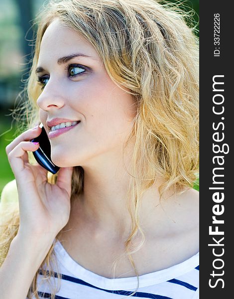 Portrait of young blonde girl at the park. Portrait of young blonde girl at the park