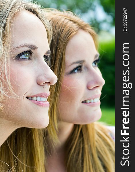 Portrait of young Adult Sisters at the park