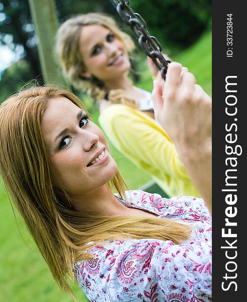 Portrait of young Adult Sisters at the park