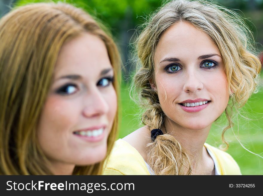 Portrait of young Adult Sisters at the park