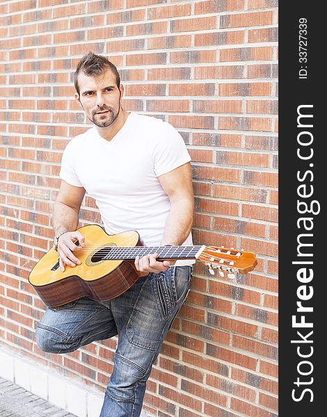 Musician with classic guitar. Musician with classic guitar.