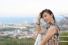 Woman Poses On A High Point Overlooking The City. Stock Images