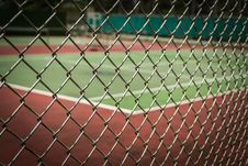 Tennis Court In Metal Fence Royalty Free Stock Photography