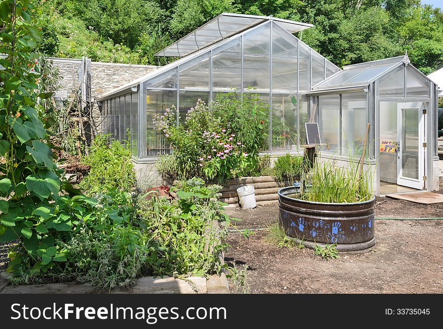 Greenhouse in garden center with trees