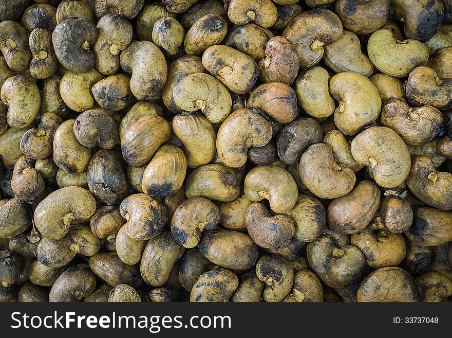 Pile of roasted cashew nut close up background. Pile of roasted cashew nut close up background