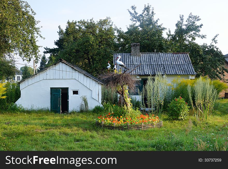 Ukrainian Country Yard With A Crane Nest