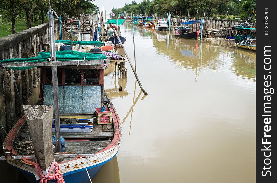 Wooden fishing boats in the canal