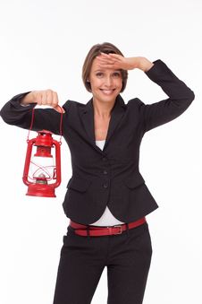 Businesswoman With Red Kerosene Lamp Royalty Free Stock Images Businesswoman With Red Kerosene Lamp Royalty Free Stock Images