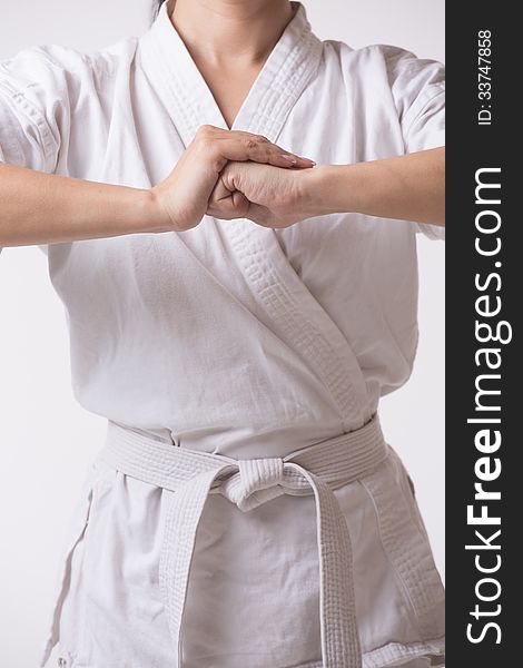 Woman in kimono going for greeting on white. Woman in kimono going for greeting on white