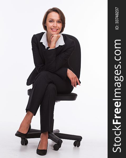 Businesswoman sit on chair isolated with white