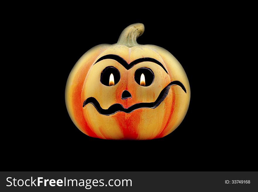 Ceramic Halloween Jack O'lantern, with candle flame for eyes. Ceramic Halloween Jack O'lantern, with candle flame for eyes