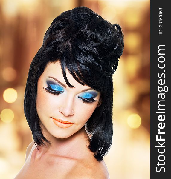 Face Of A Beautiful Woman With Blue Makeup