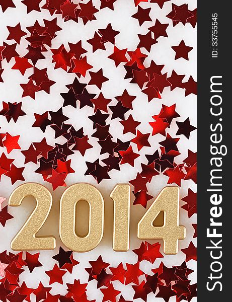 2014 year golden figures on the background of red stars