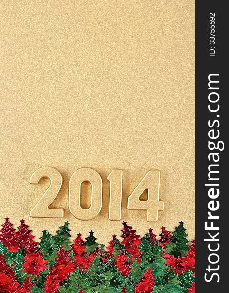 2014 year golden figures and varicolored confettii in the form of Christmas trees