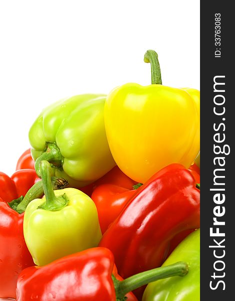 Multi-colour peppers on a white background.