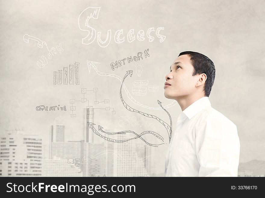 Asian Businessman Looking Up To Success Concept And Ideas. Asian Businessman Looking Up To Success Concept And Ideas