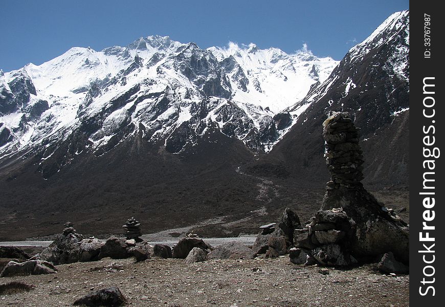 Stone handmade mortars in a mountain valley in the Himalayas, Nepal
