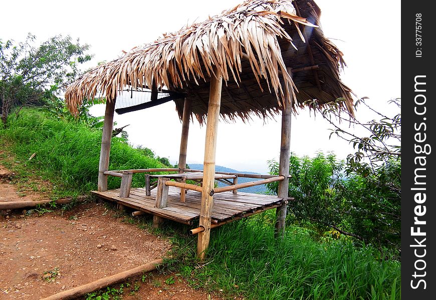 A small pavillion made from bamboo stretcher and nipa leaves roof. A small pavillion made from bamboo stretcher and nipa leaves roof.