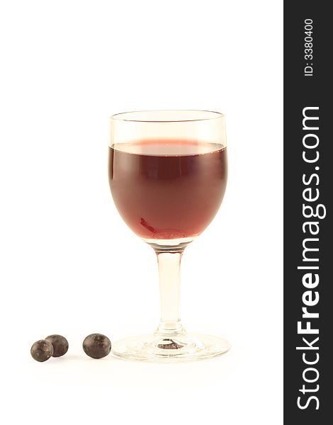 Grapes and a glass with red wine isolated on white. Grapes and a glass with red wine isolated on white.