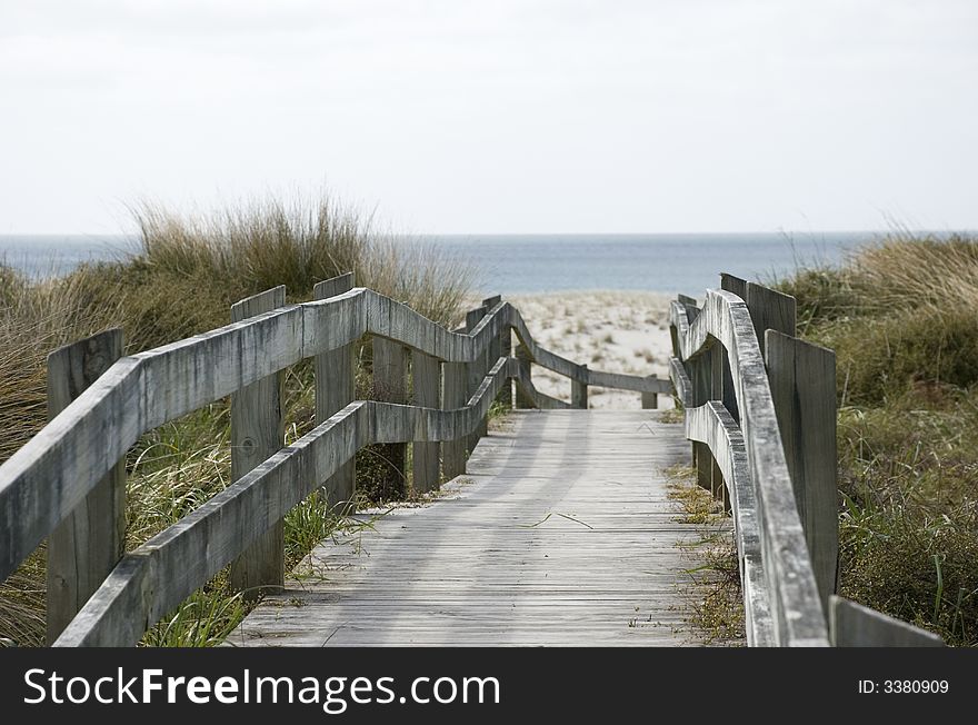 Wooden boardwalk leading to the beach. Wooden boardwalk leading to the beach