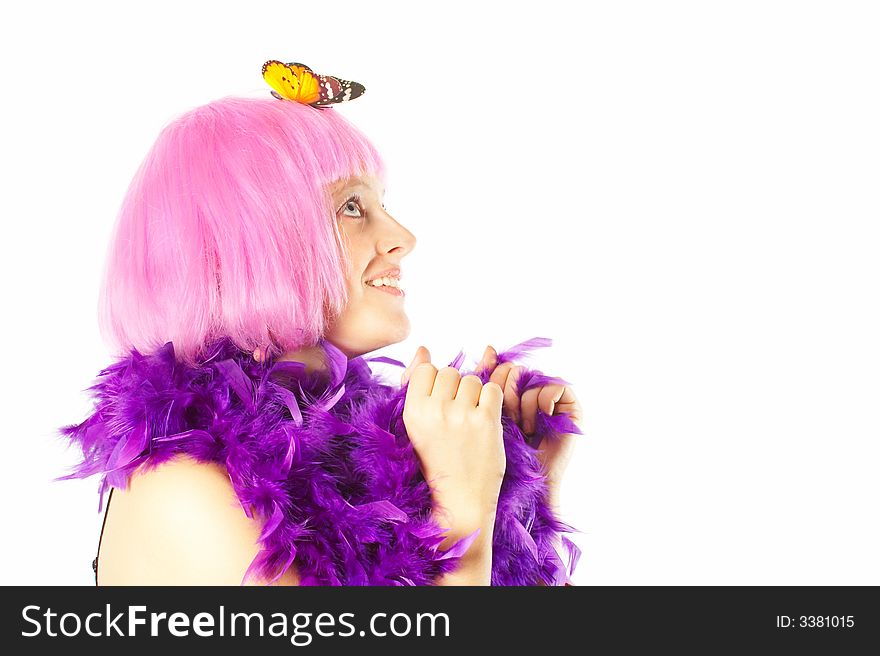 Girl in the pink wig and butterfly on her head. Girl in the pink wig and butterfly on her head