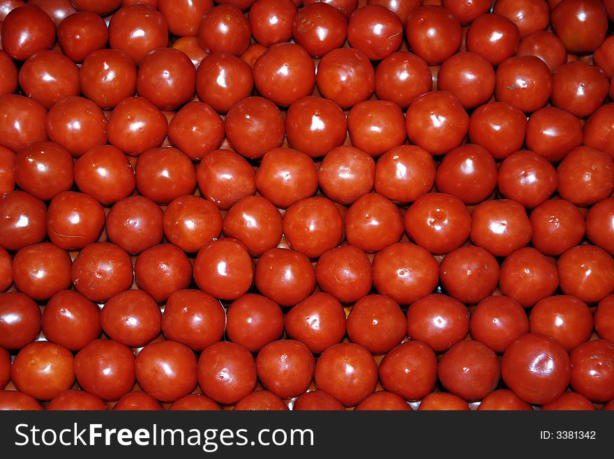 Photo of tomatoes arranged at the market. Photo of tomatoes arranged at the market