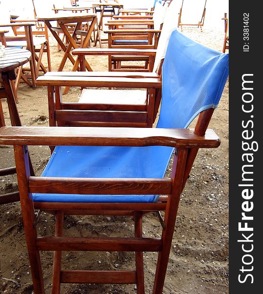 Wooden chairs in a row at the cafeteria