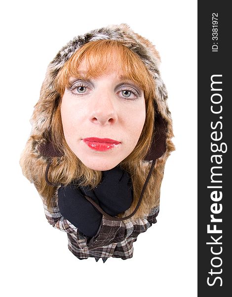 Woman with Winterclothes looking into camera. Overstated Fisheye-Effect. Isolated on white. Woman with Winterclothes looking into camera. Overstated Fisheye-Effect. Isolated on white.