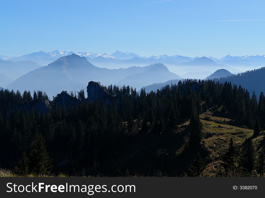 Alpes, Bavaria, Germany .
Sight from the Kampenwand Mountain ( Height 1665 m ).High Alpes in Austria  is in the distance.October 2007 . Alpes, Bavaria, Germany .
Sight from the Kampenwand Mountain ( Height 1665 m ).High Alpes in Austria  is in the distance.October 2007 .