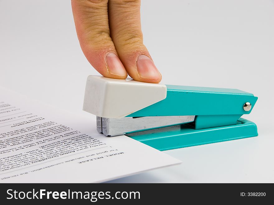 Fasten documents with office stapler. Routine work. Fasten documents with office stapler. Routine work.